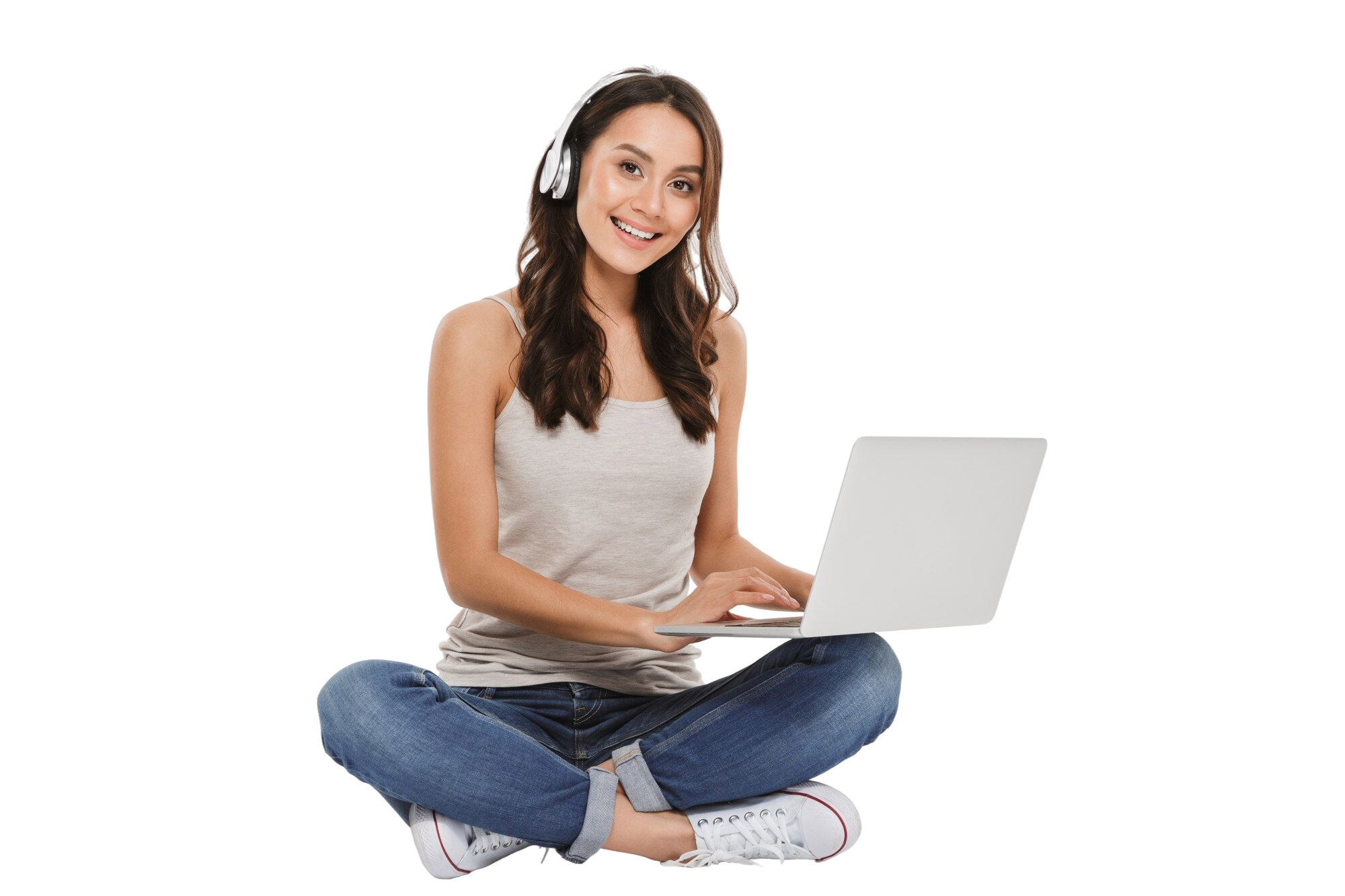 beautiful-woman-listening-music-chatting-using-headphones-laptop-while-sitting-with-legs-crossed-floor-white-wall